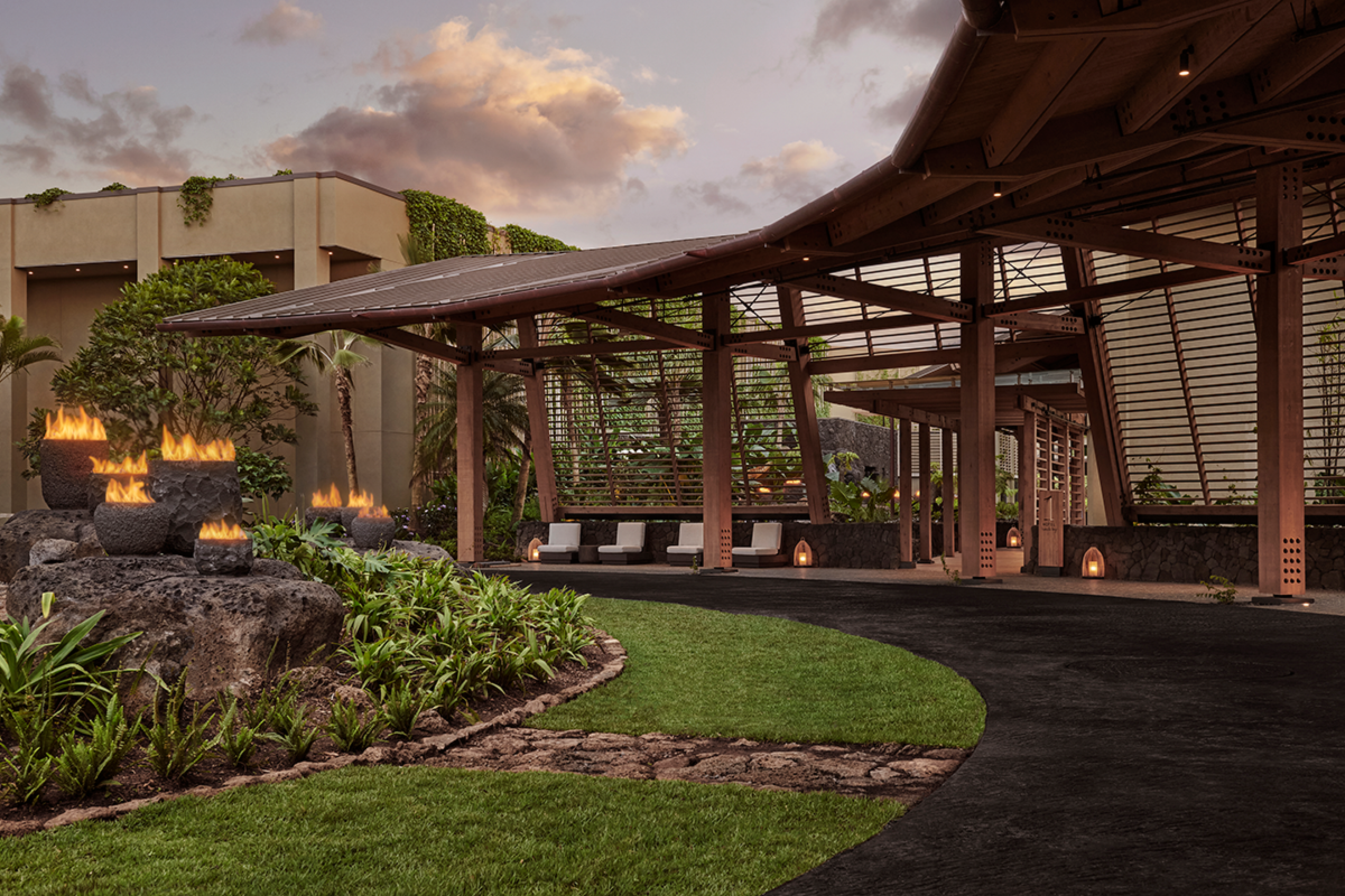 1 Hotel Hanalei Bay Entrance with fire pits and outdoor chairs