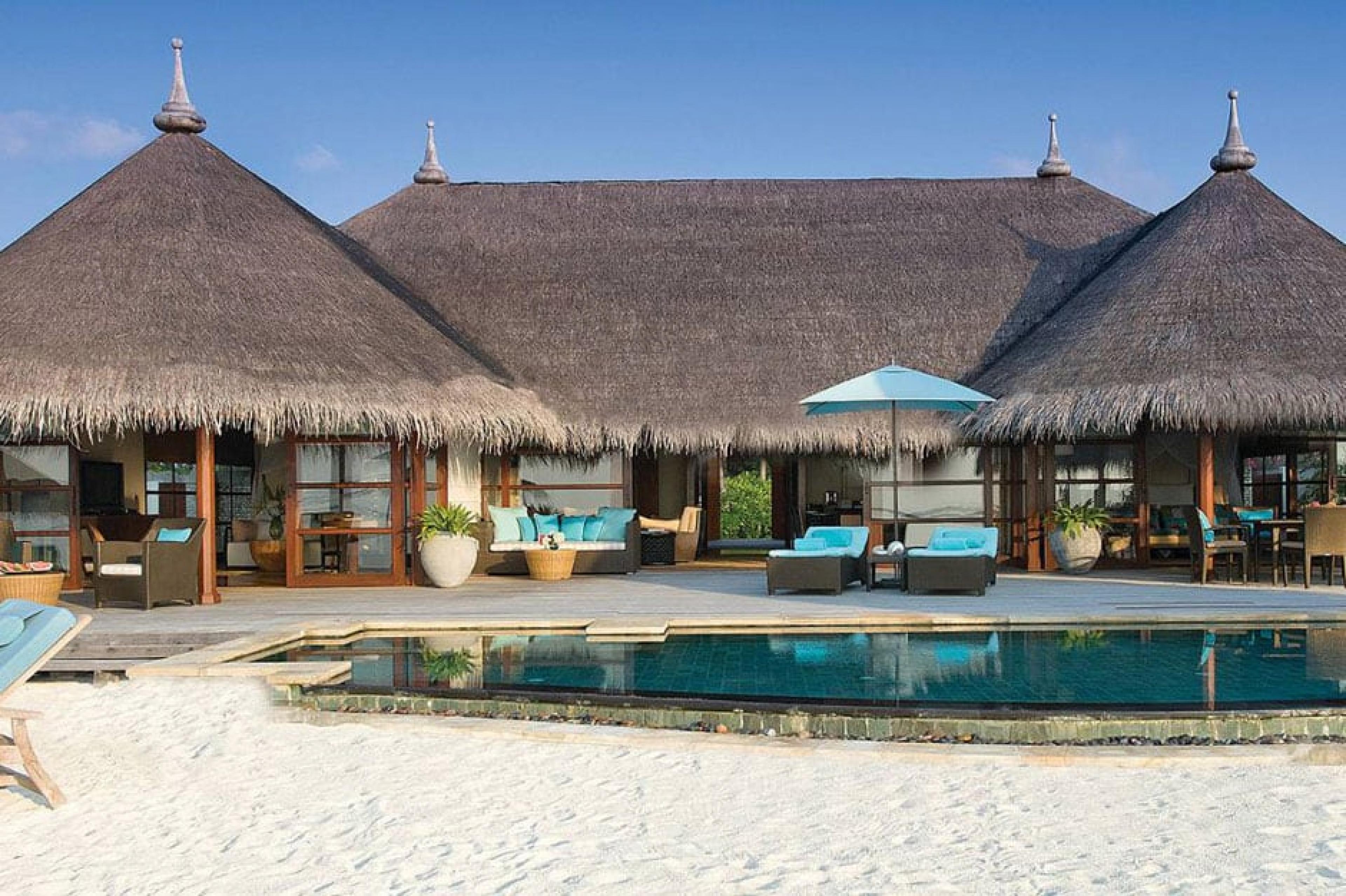 Outdoor Pool Lounge at Four Seasons Kuda Huraa, Maldives
