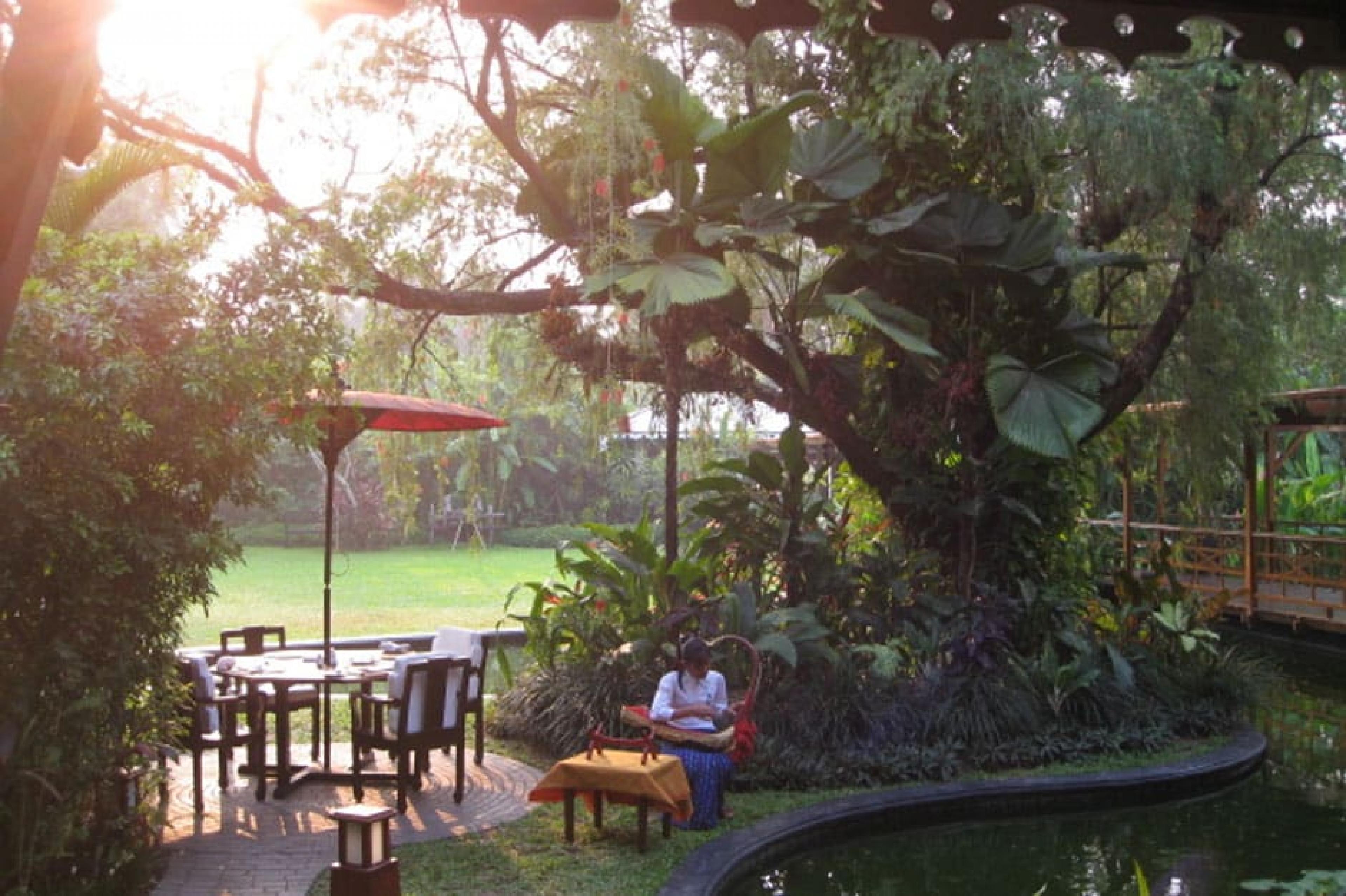 Garden Lounge at Reflection in Pool at Belmond Governor’s Residence, Myanmar