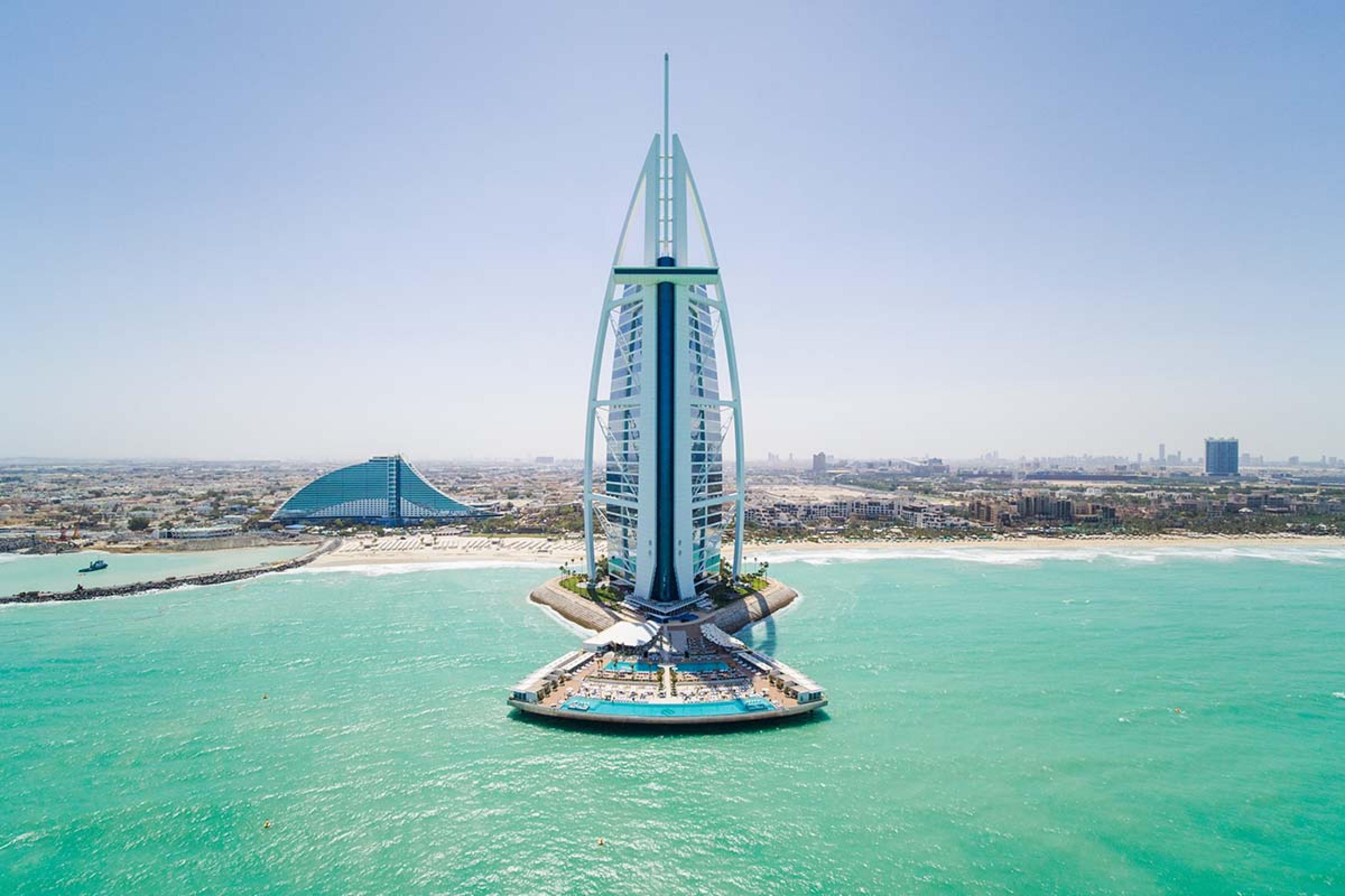 contemporary sky scraper on a peninsula sticking out from Dubai