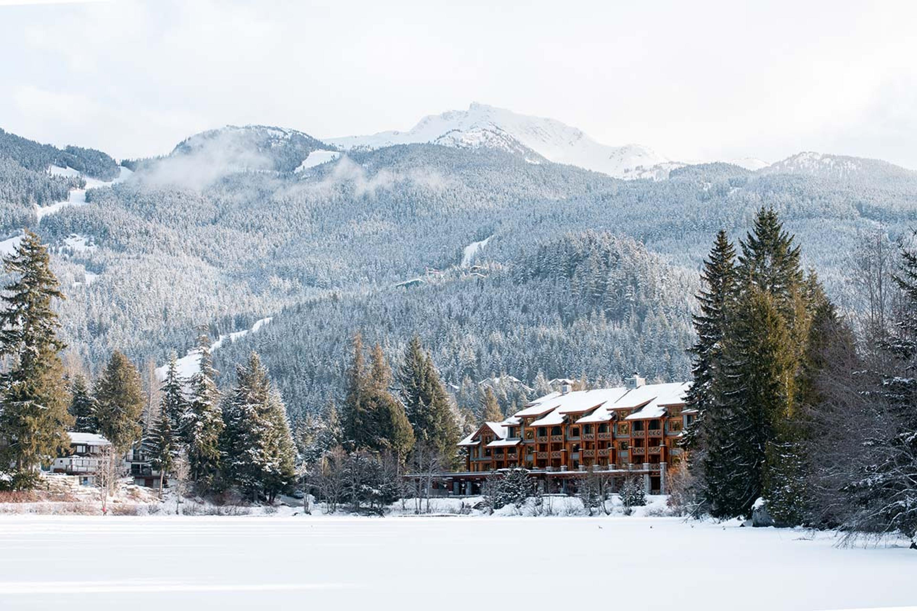 lodge on a snowy frozen lake