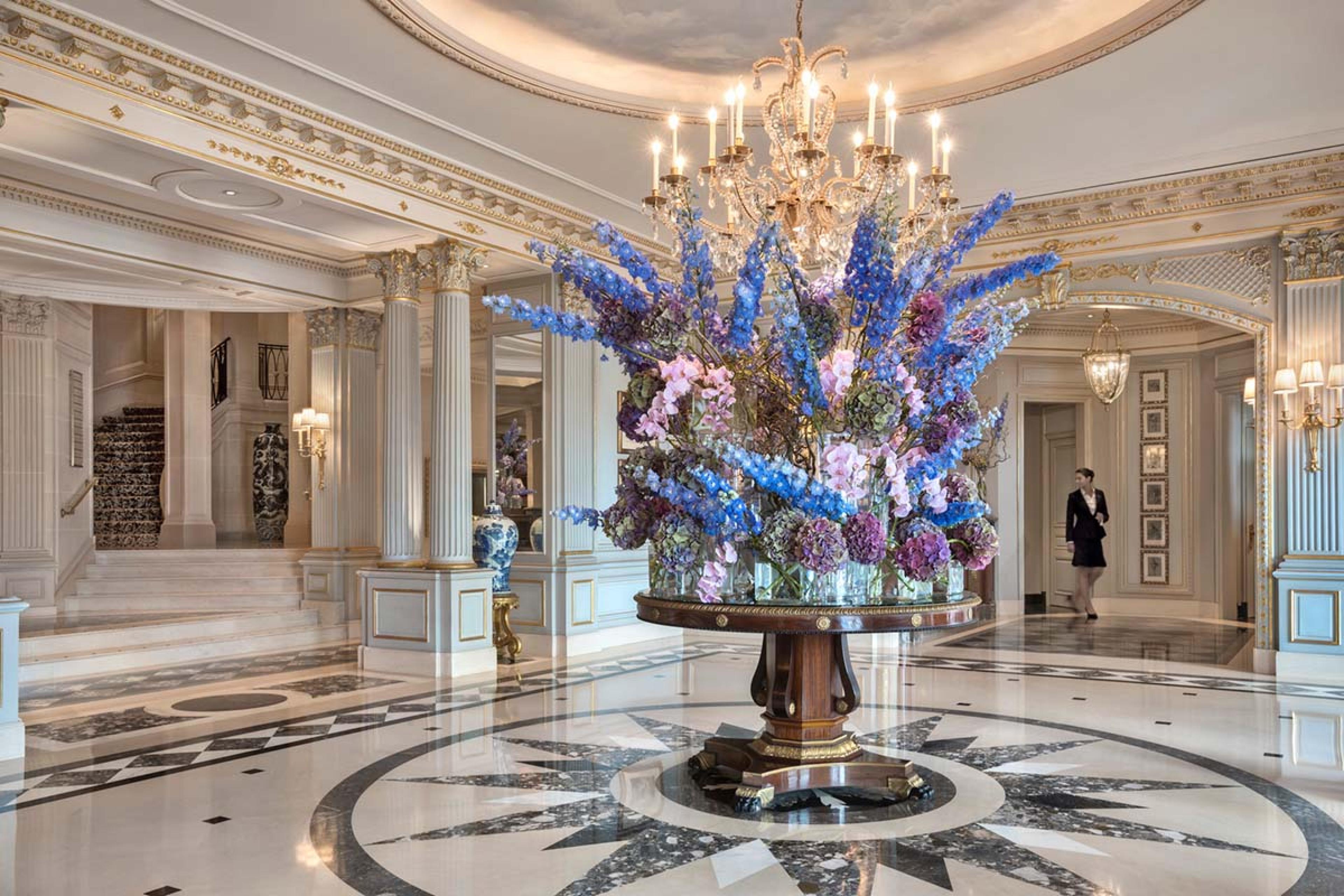 lobby with a large purple and blue flower center piece