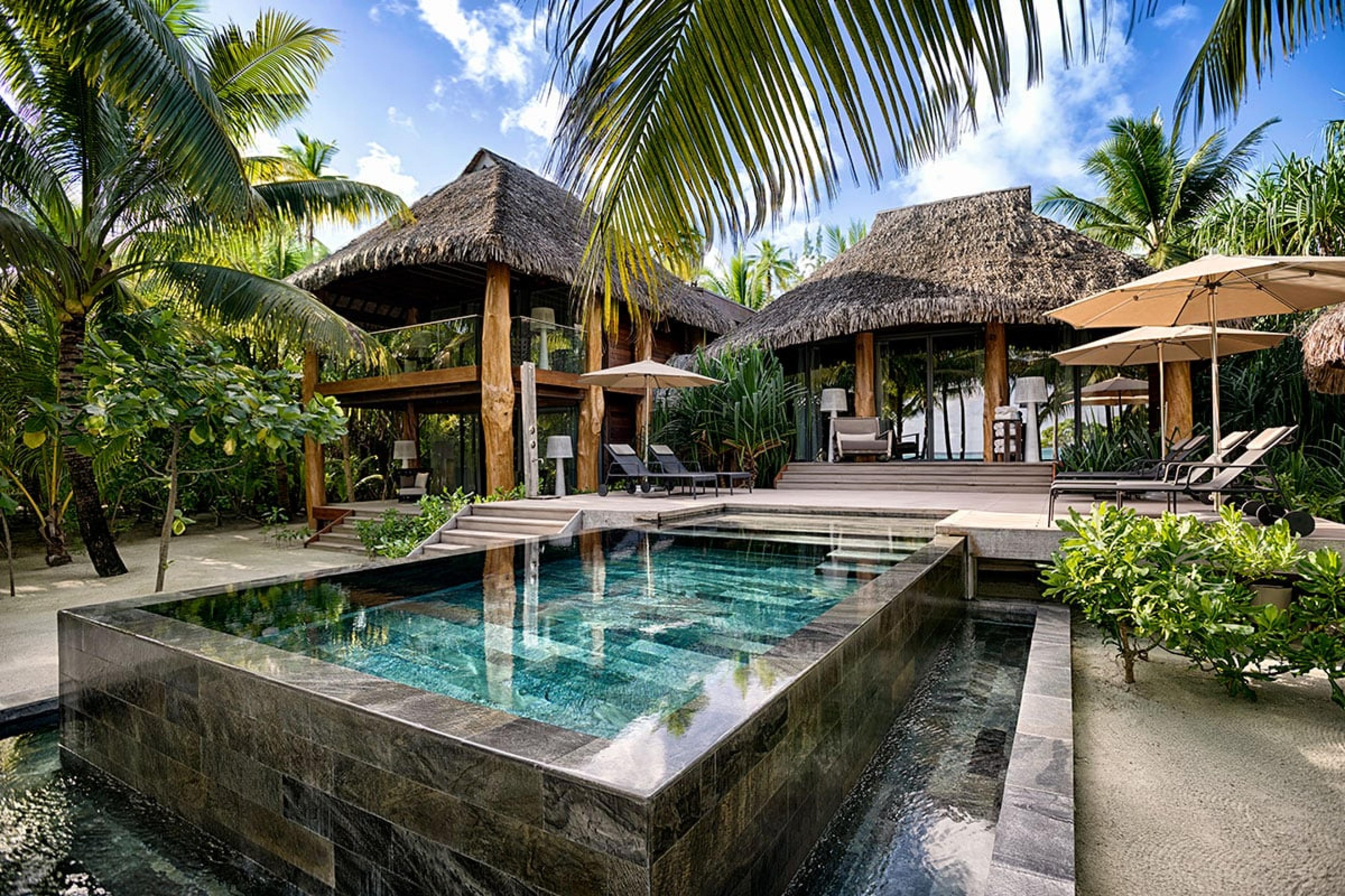 villa with private pool and polynesian architecture