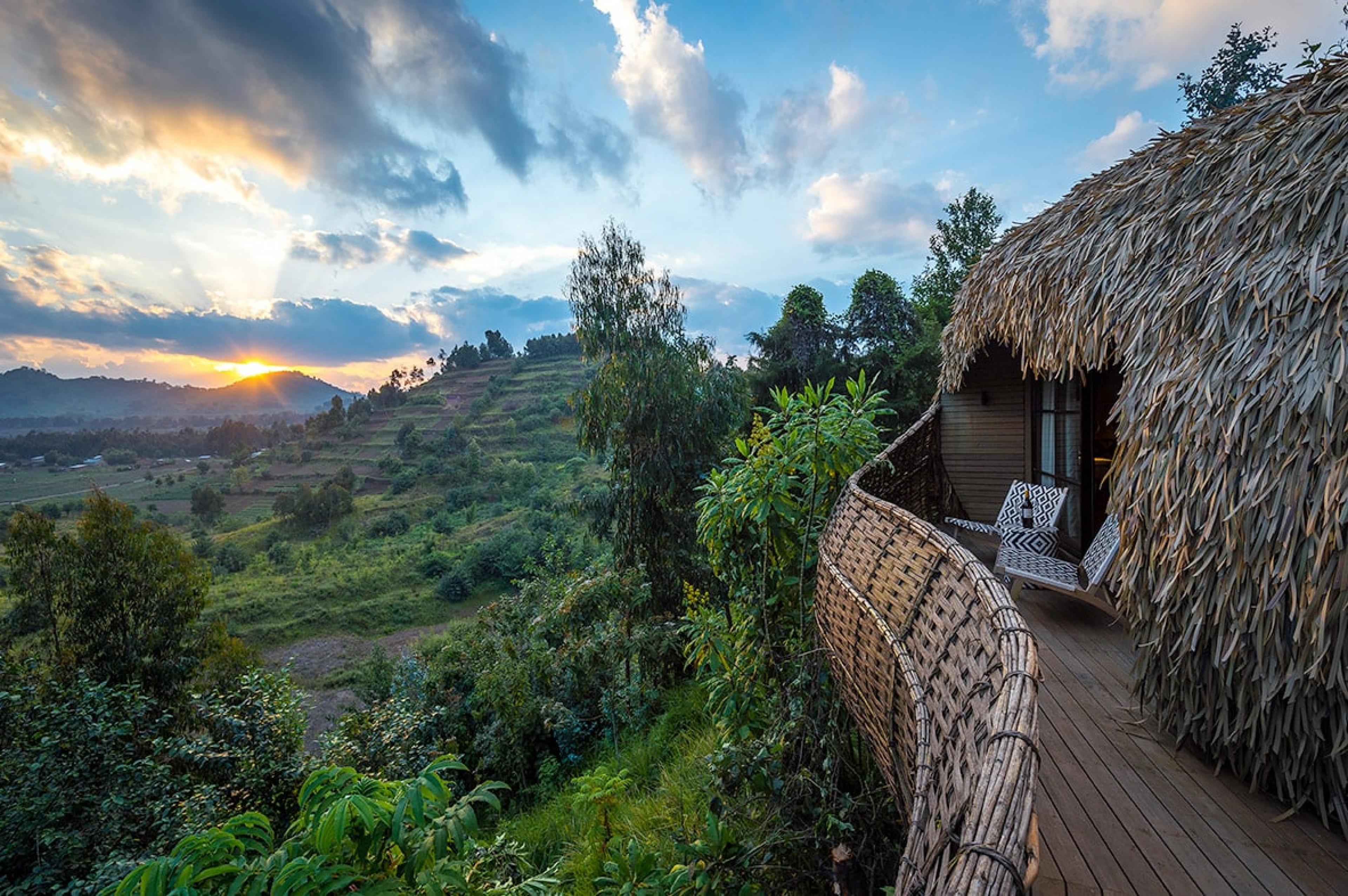 balcony in safari lodge overlooking lush green hillside
