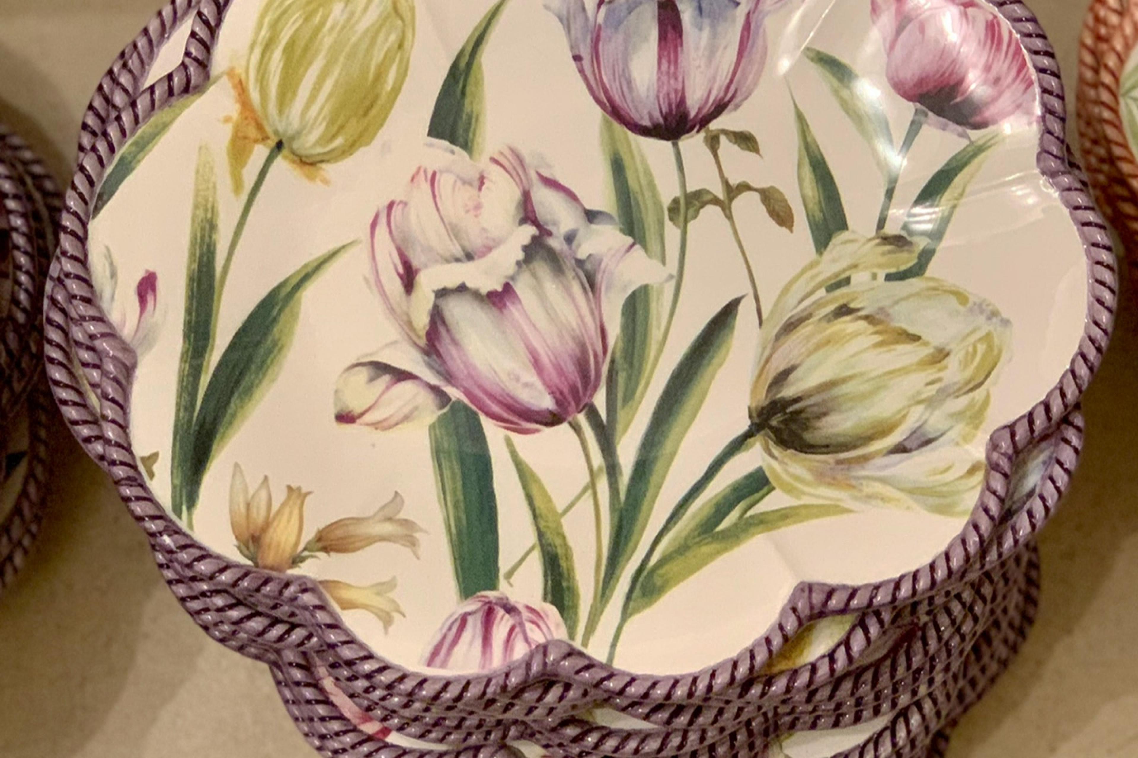 detail of ceramic plates with tulips painted on them