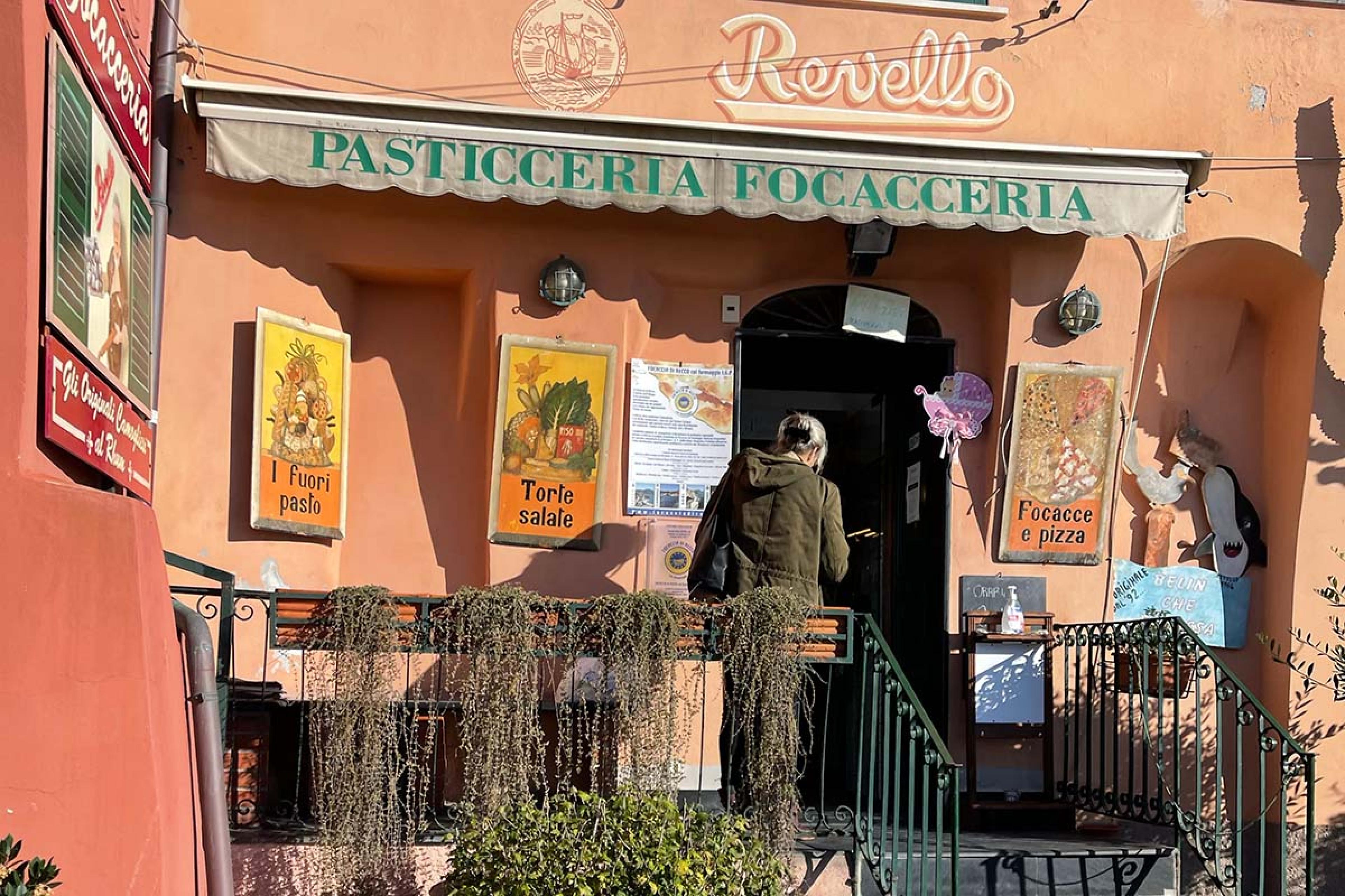 pink building with fringe that says Pasticceria Focacceria on it