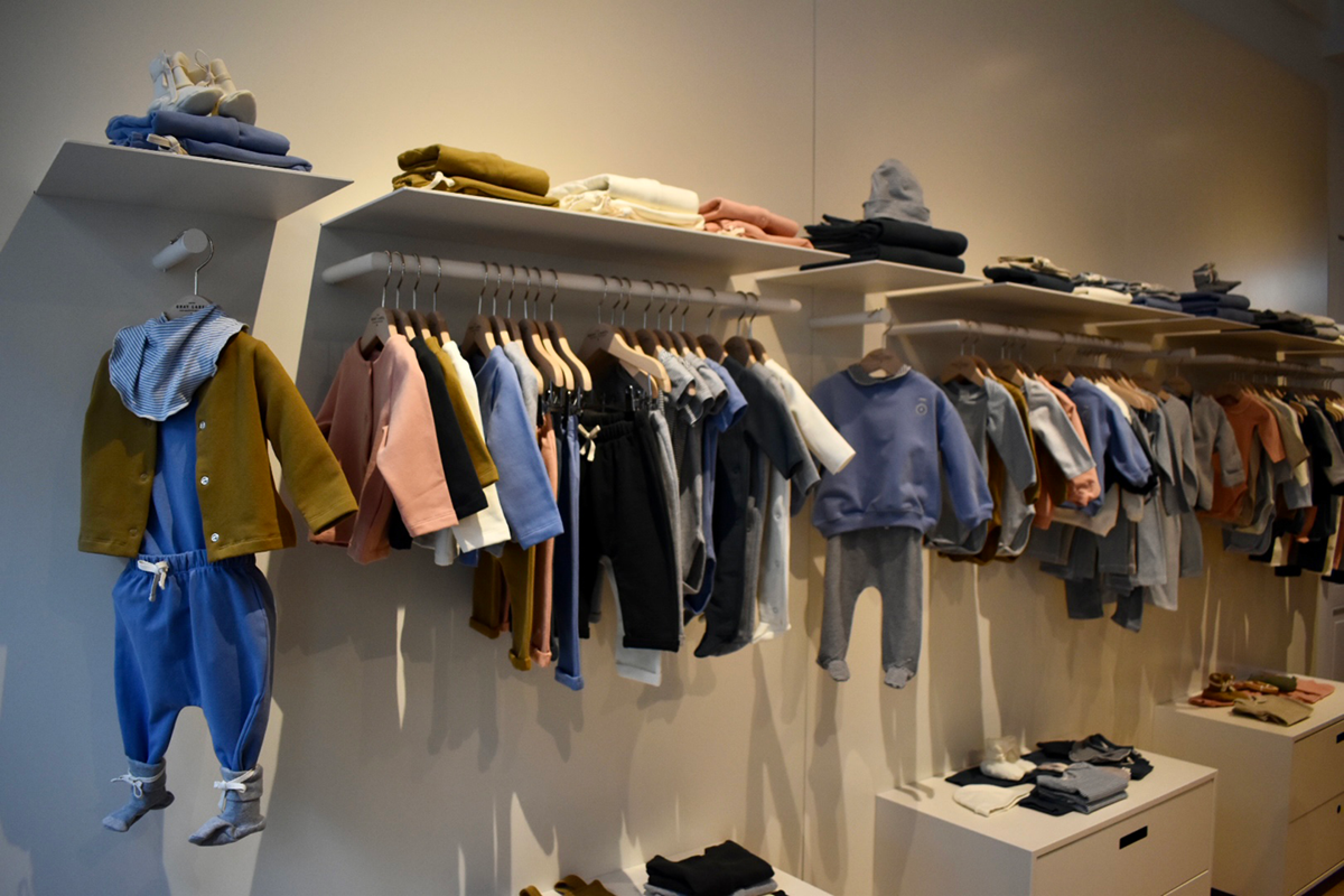 Children's clothes hang in Gray Label store in Amsterdam