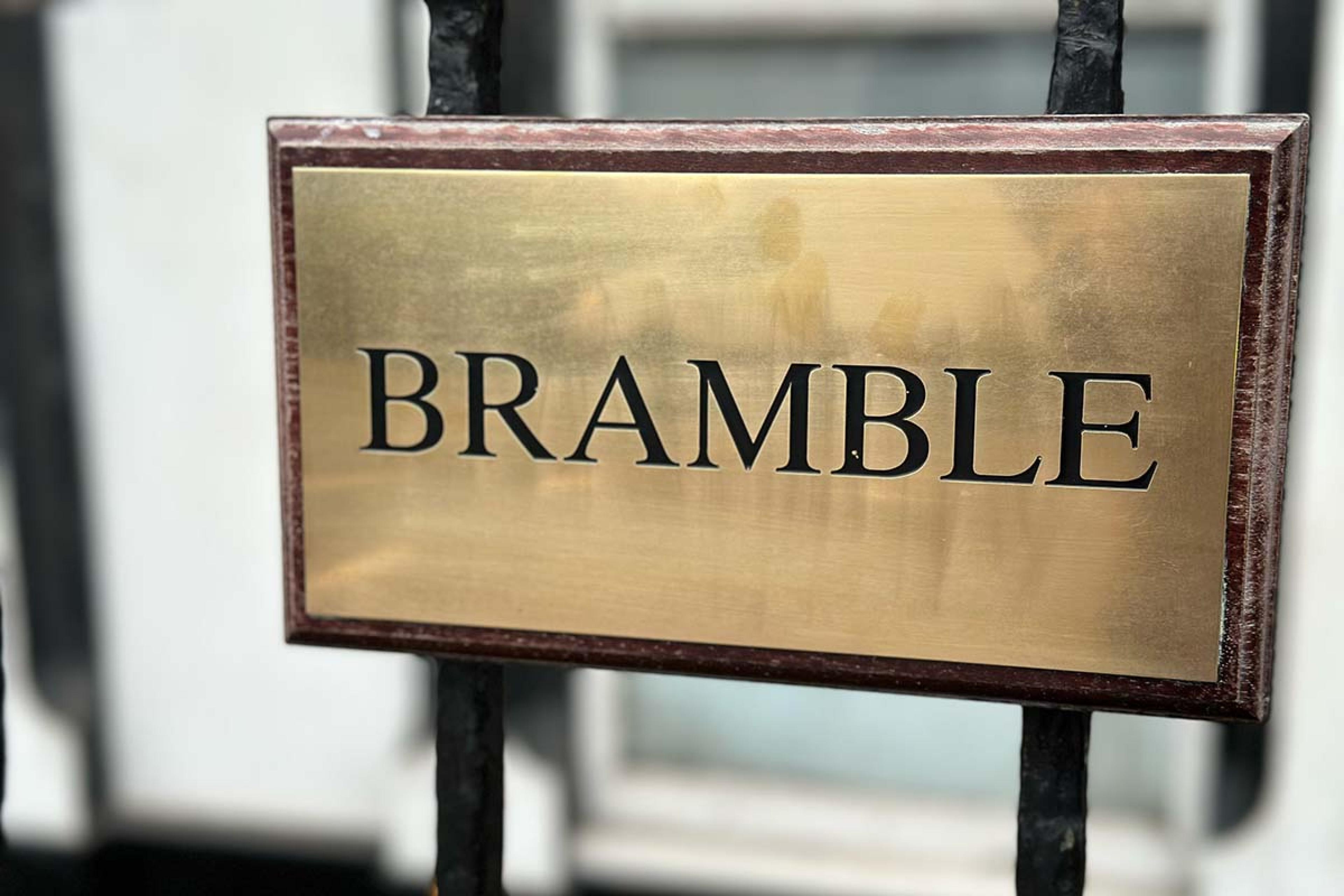 golden embossed sign that says "Bramble"