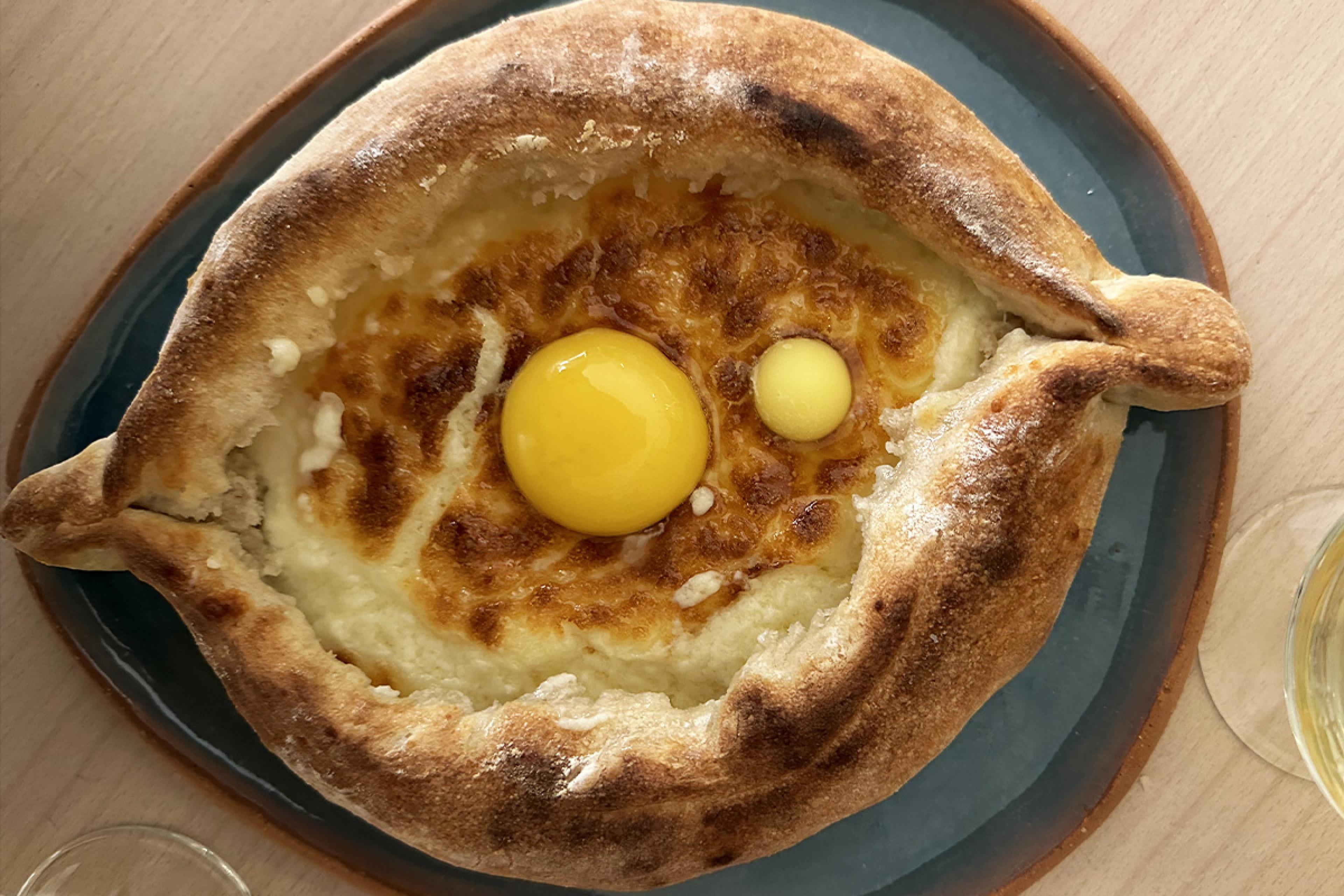 cheese stuffed bread with an egg