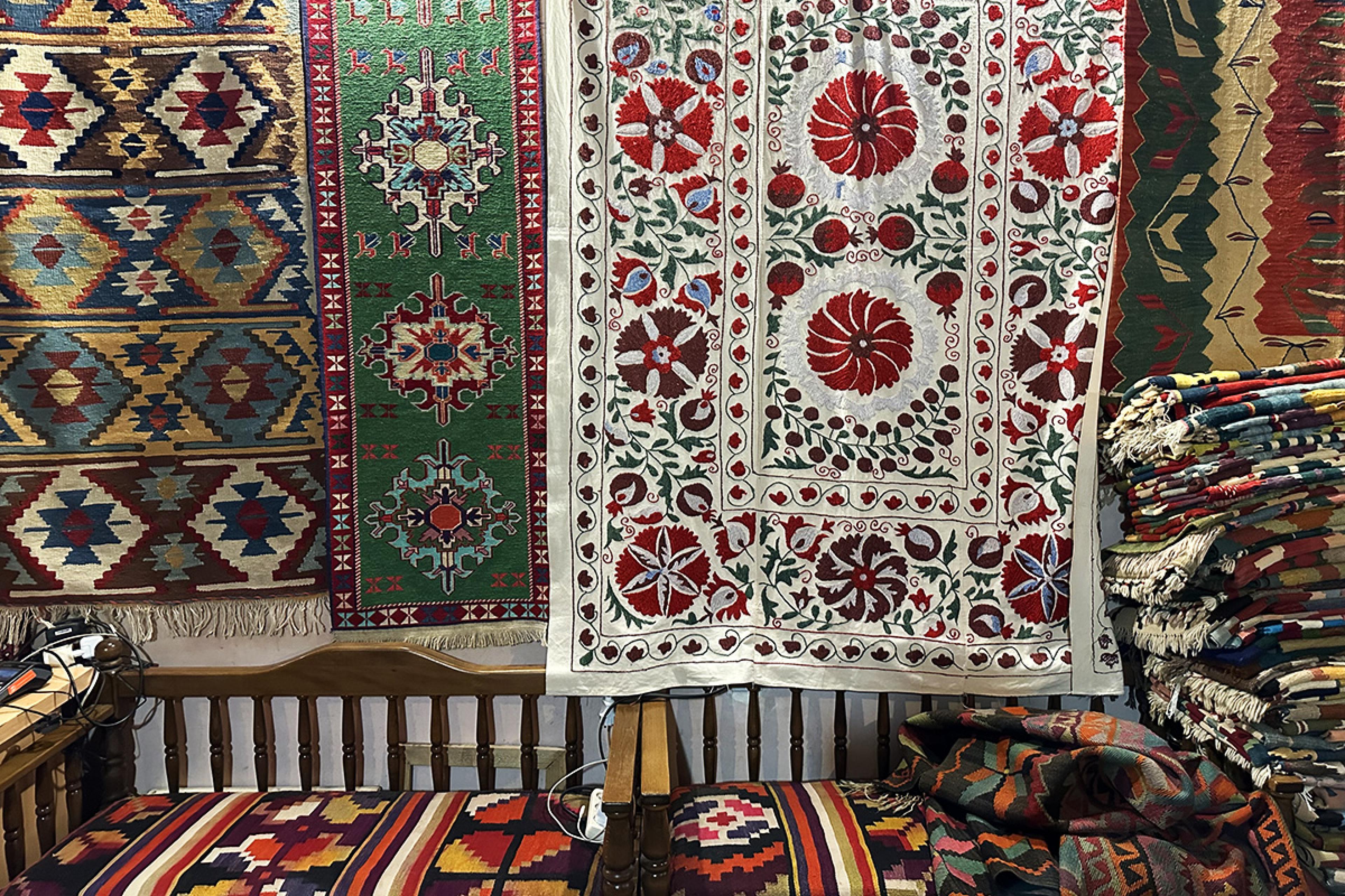 ornate carpets hanging on the wall
