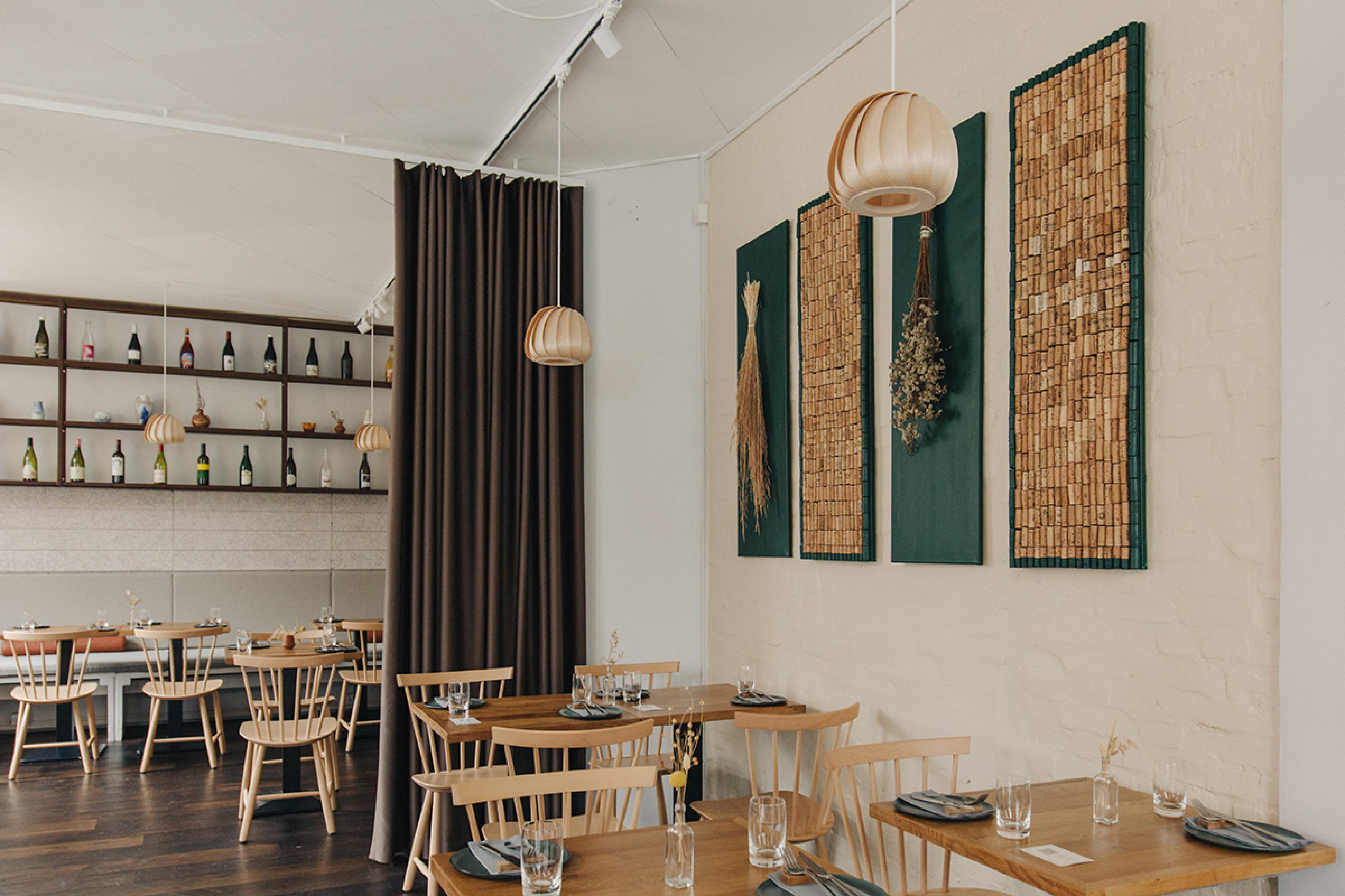 simple danish restaurant with light wood furniture