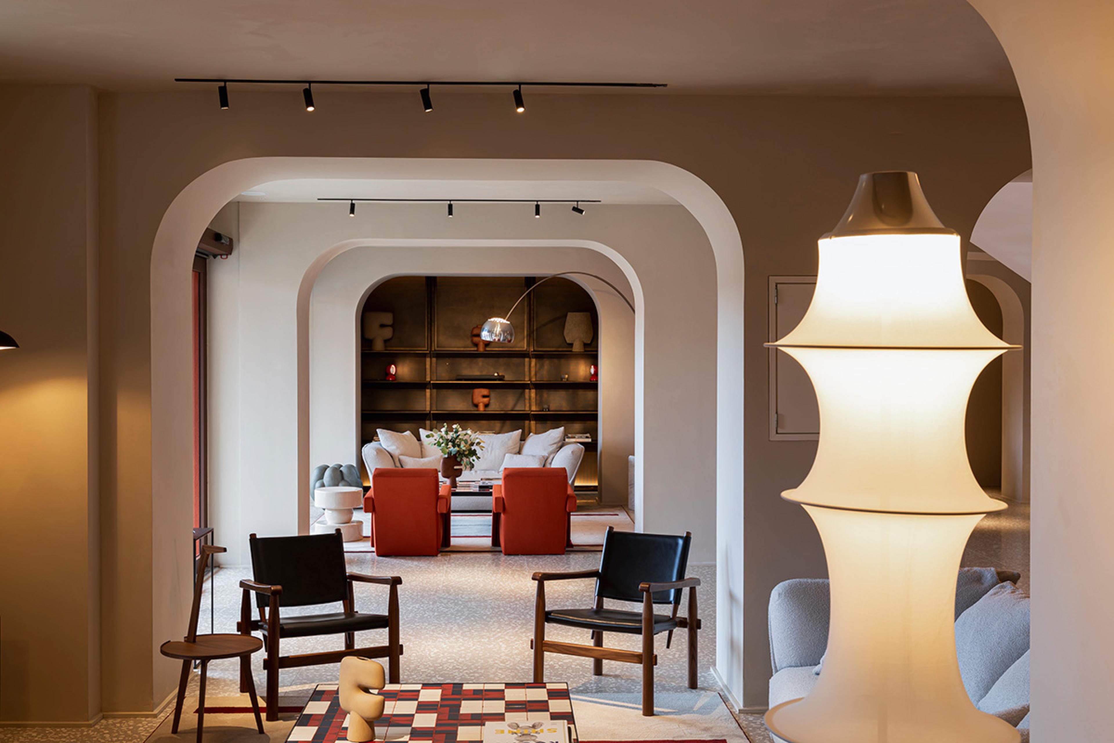 interior of stylish italian hotel with contemporary seating areas and warm lighting