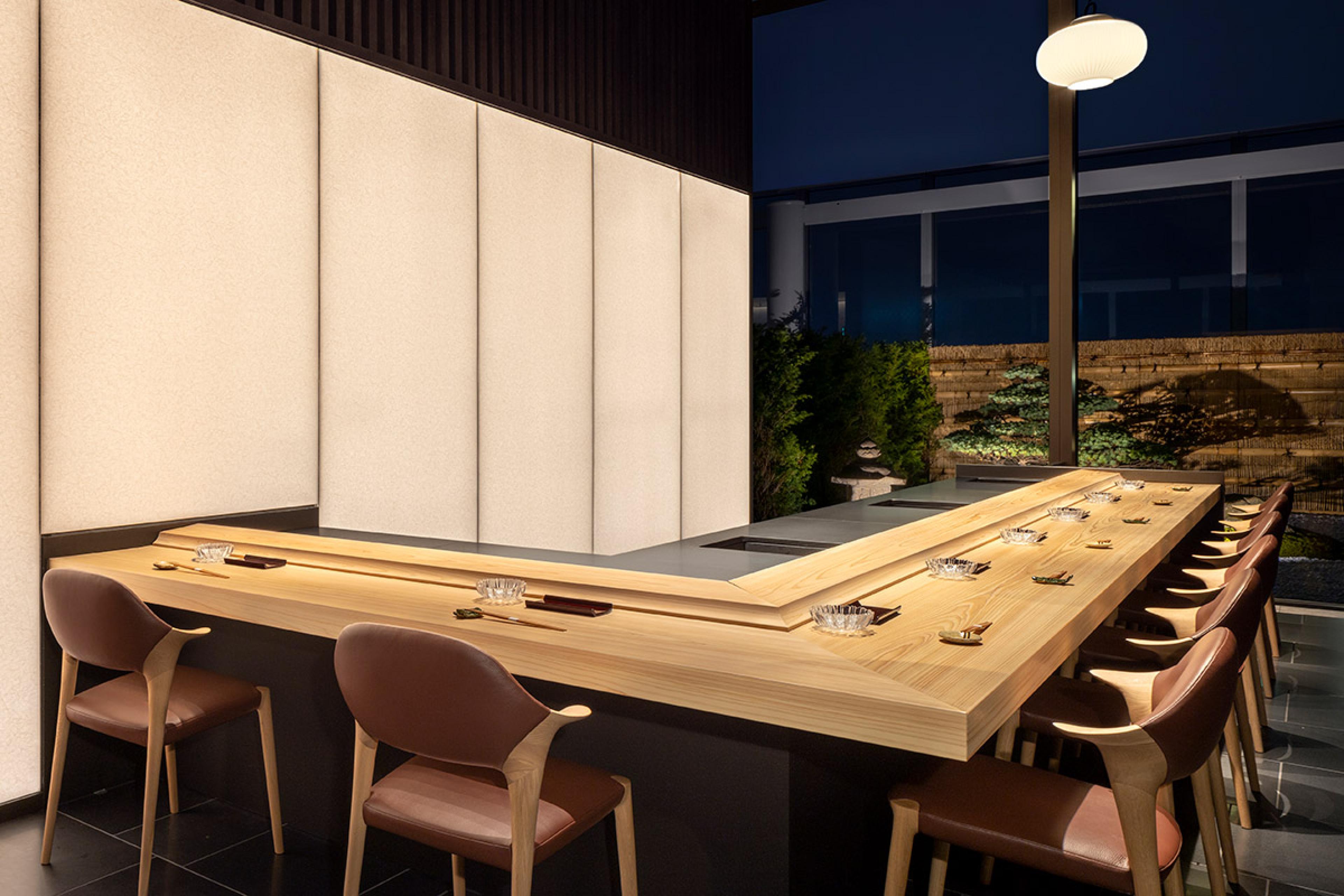 omakase restaurant with pale wooden counter and under 10 seats for dining