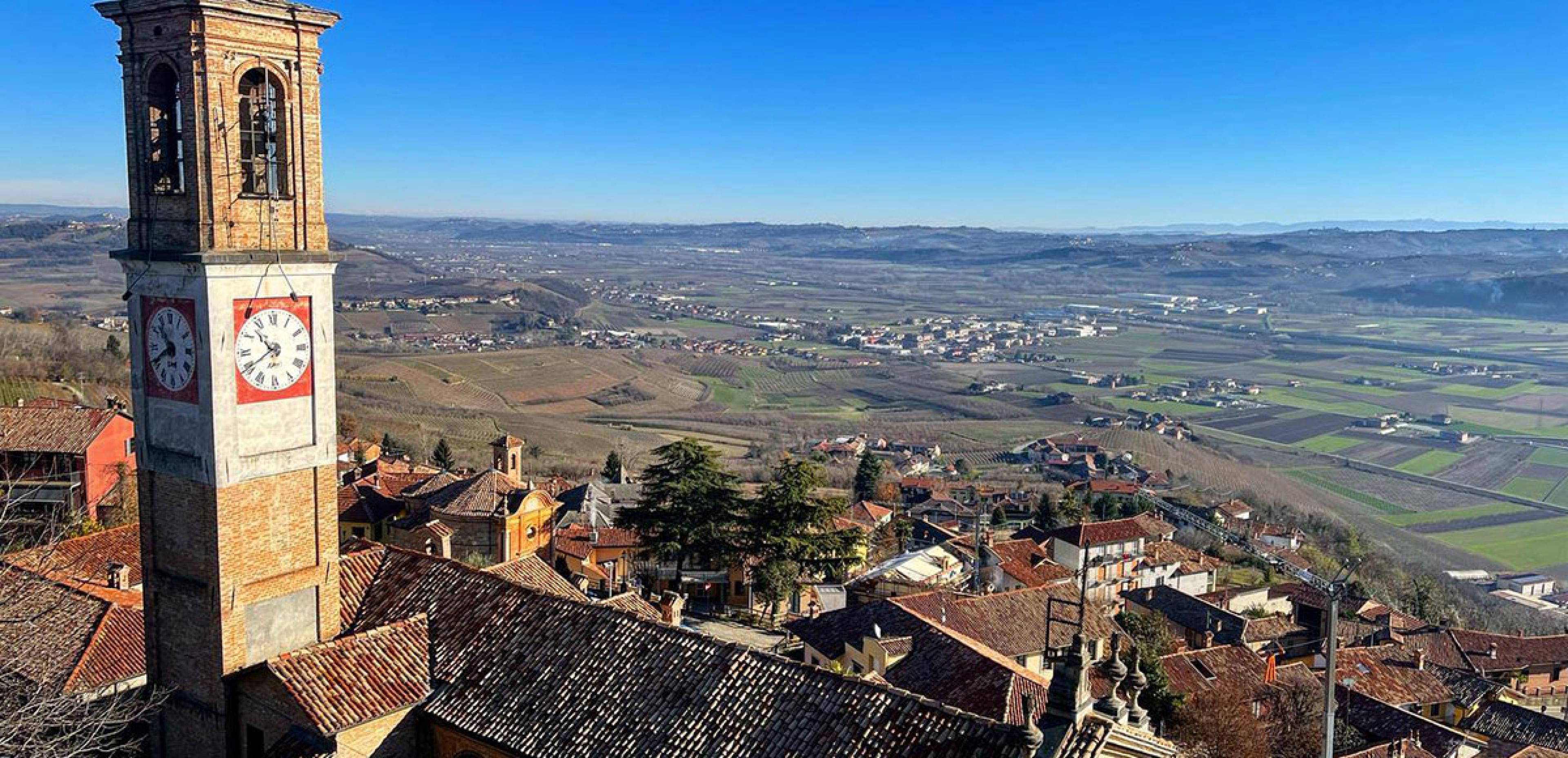 view over medieval town with italian church steeple overlooking countryside