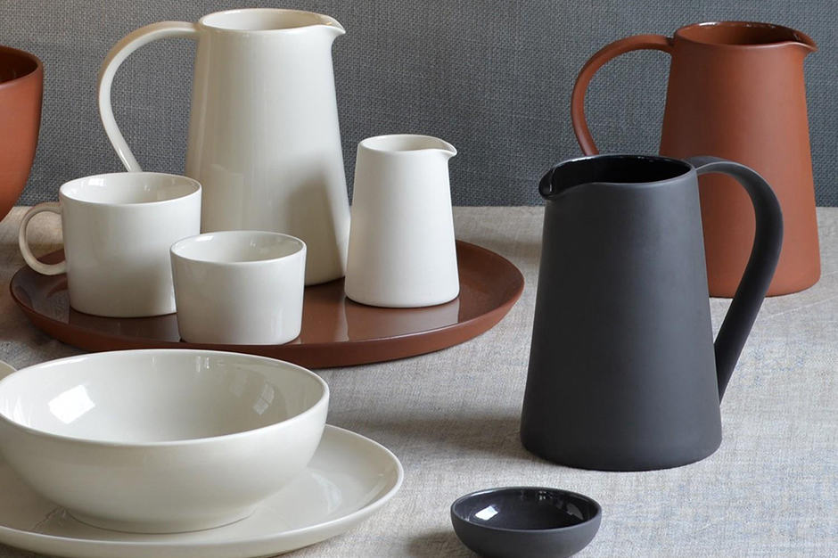 White gray and brown ceramic pitchers and bowls at Kollekted By in Oslo