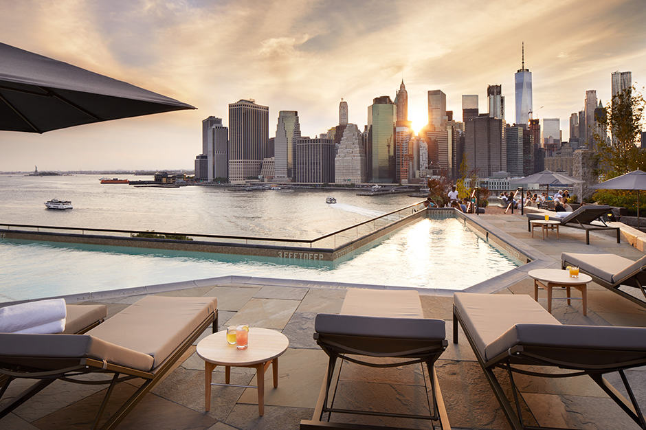 Rooftop pool and lounge chairs at 1 Hotel Brooklyn Bridge 