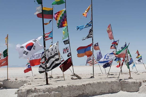 National flags at the Salar de Uyuni in Bolivia