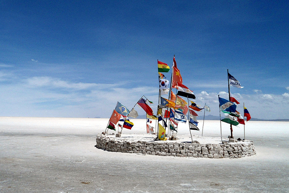 National flags at Salar de Uyuni in Bolivia