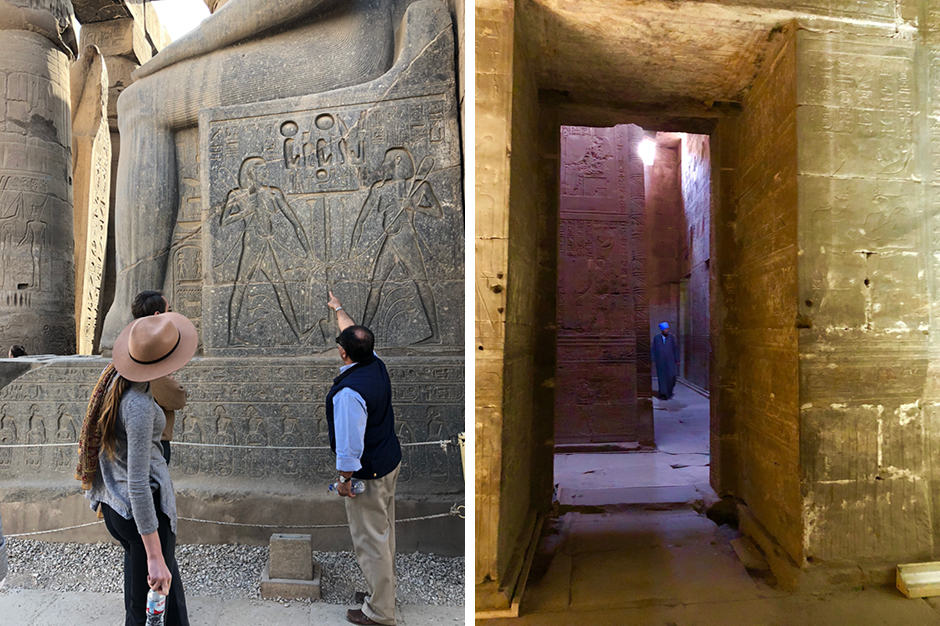 A guide explains a hieroglyph to tourists in Egypt; the Temple of Horus