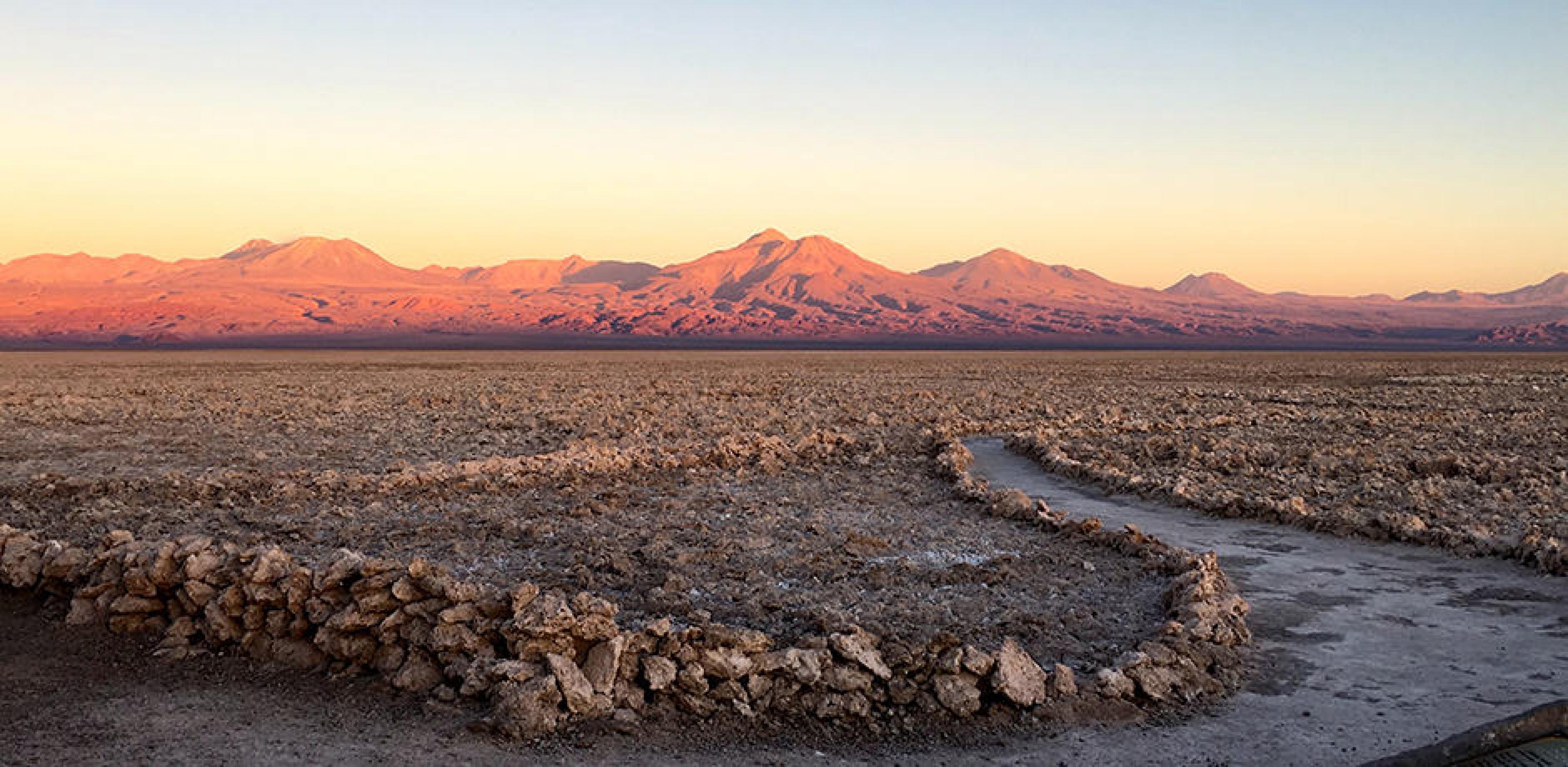 A colorful sunset at the Salar de Atacama (Atacama Salt Flat),  Atacama Desert in Chile.