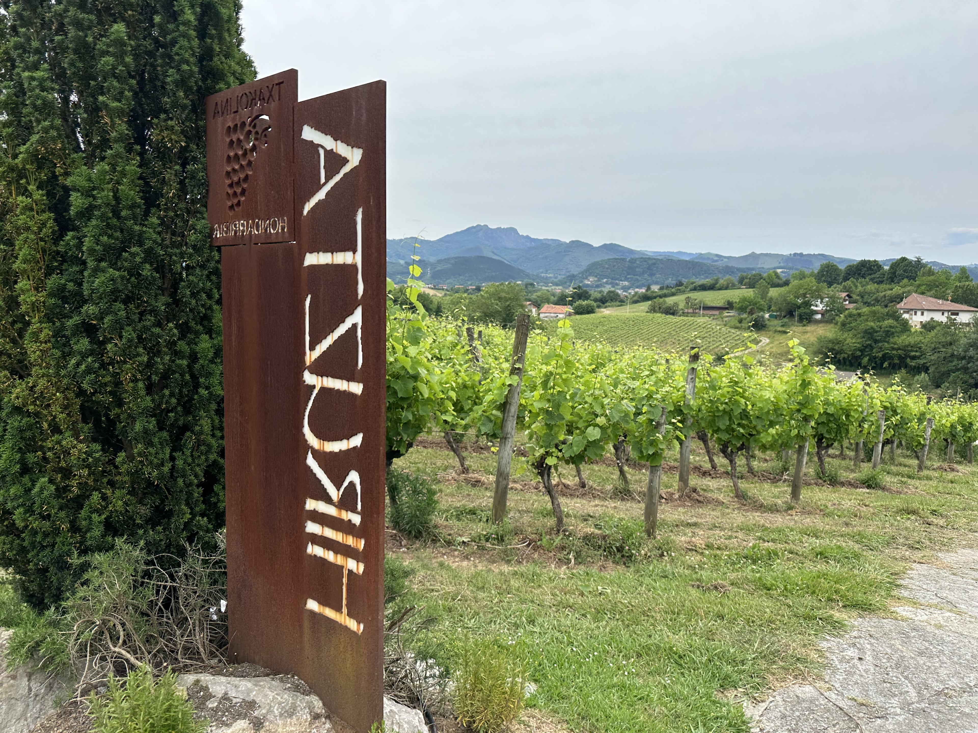 vertical wooden sign in a winery