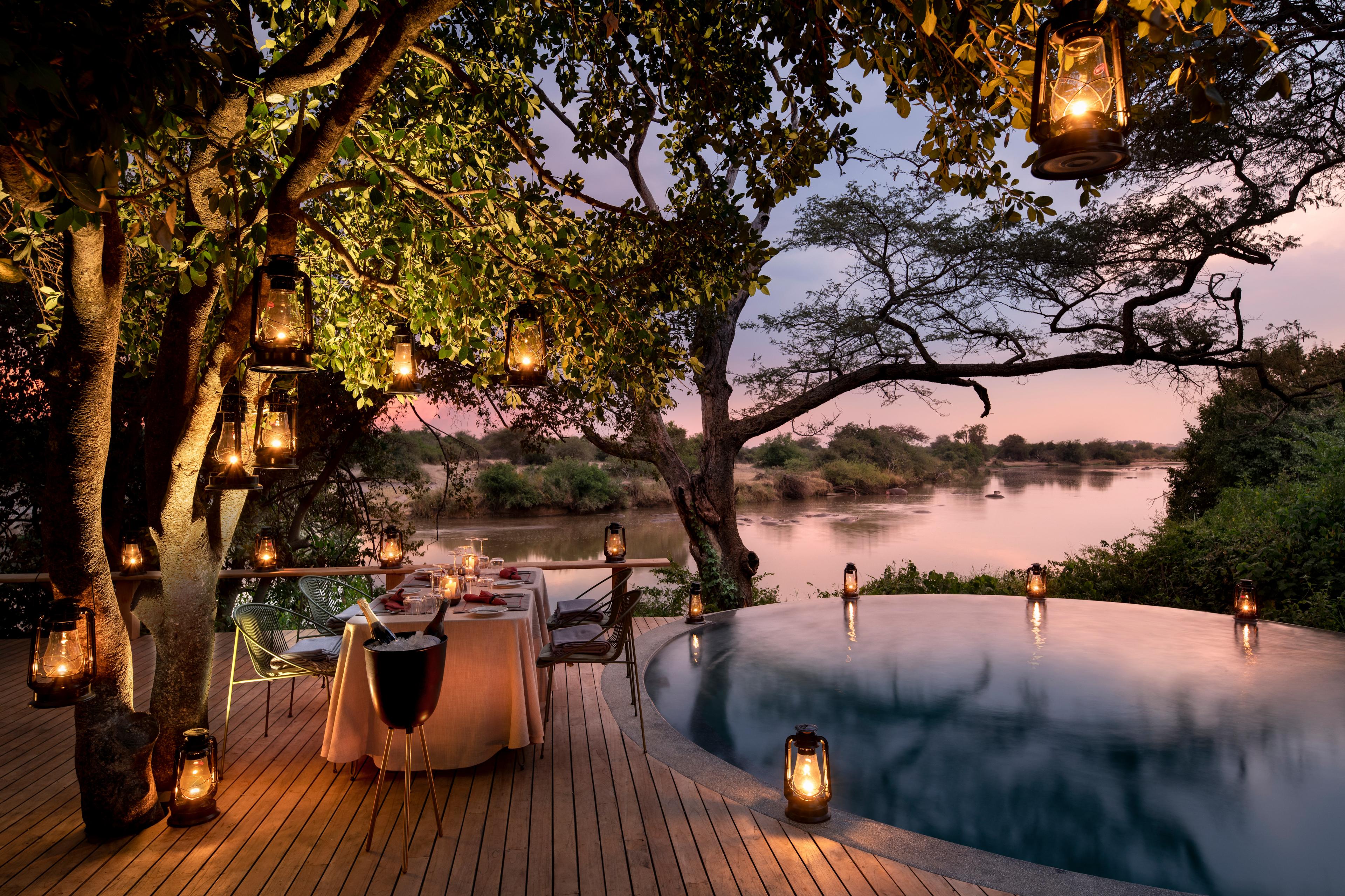 infinity pool set in a patio in the African bush