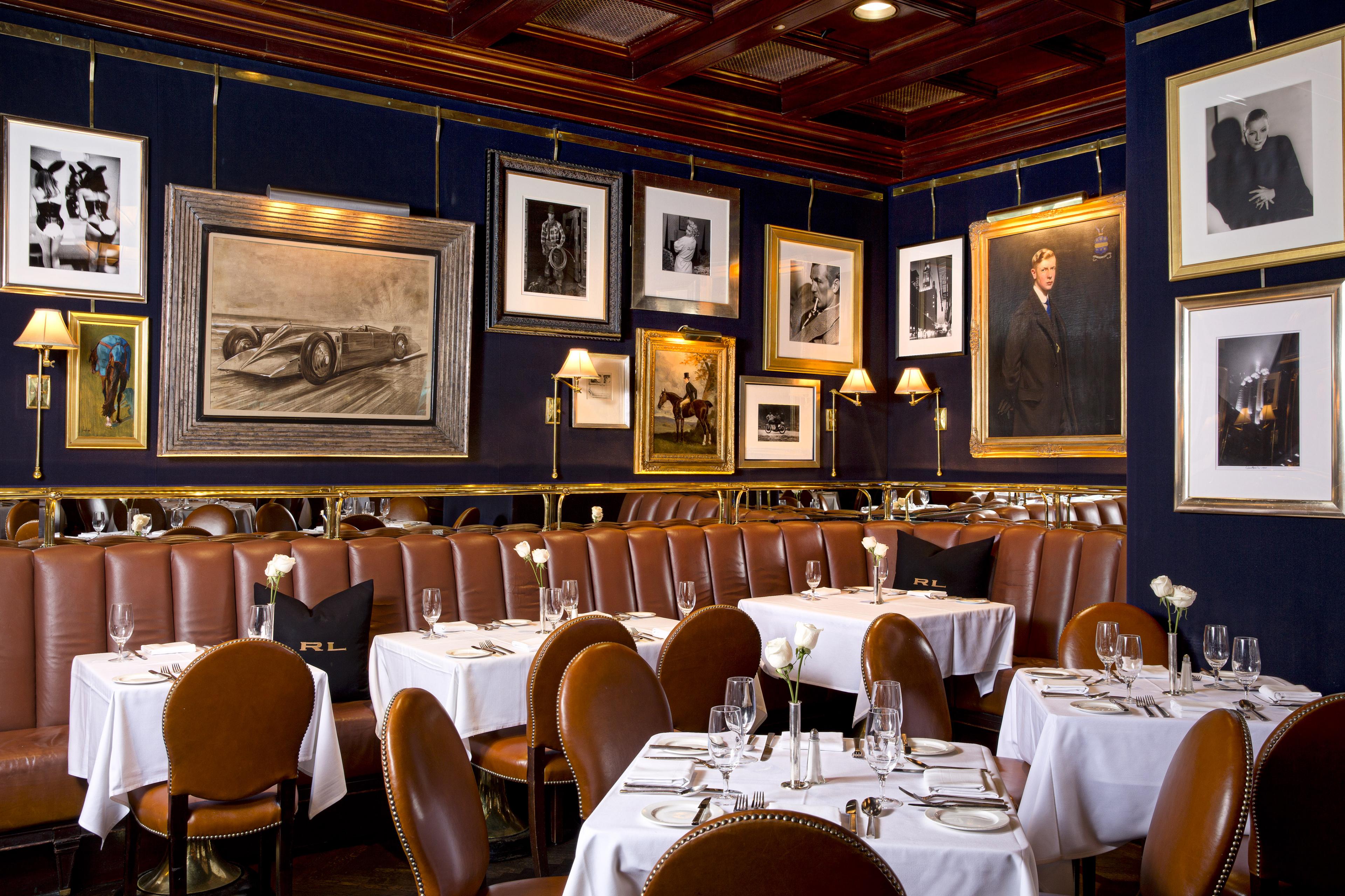 interior of restaurant with portraits on the wall
