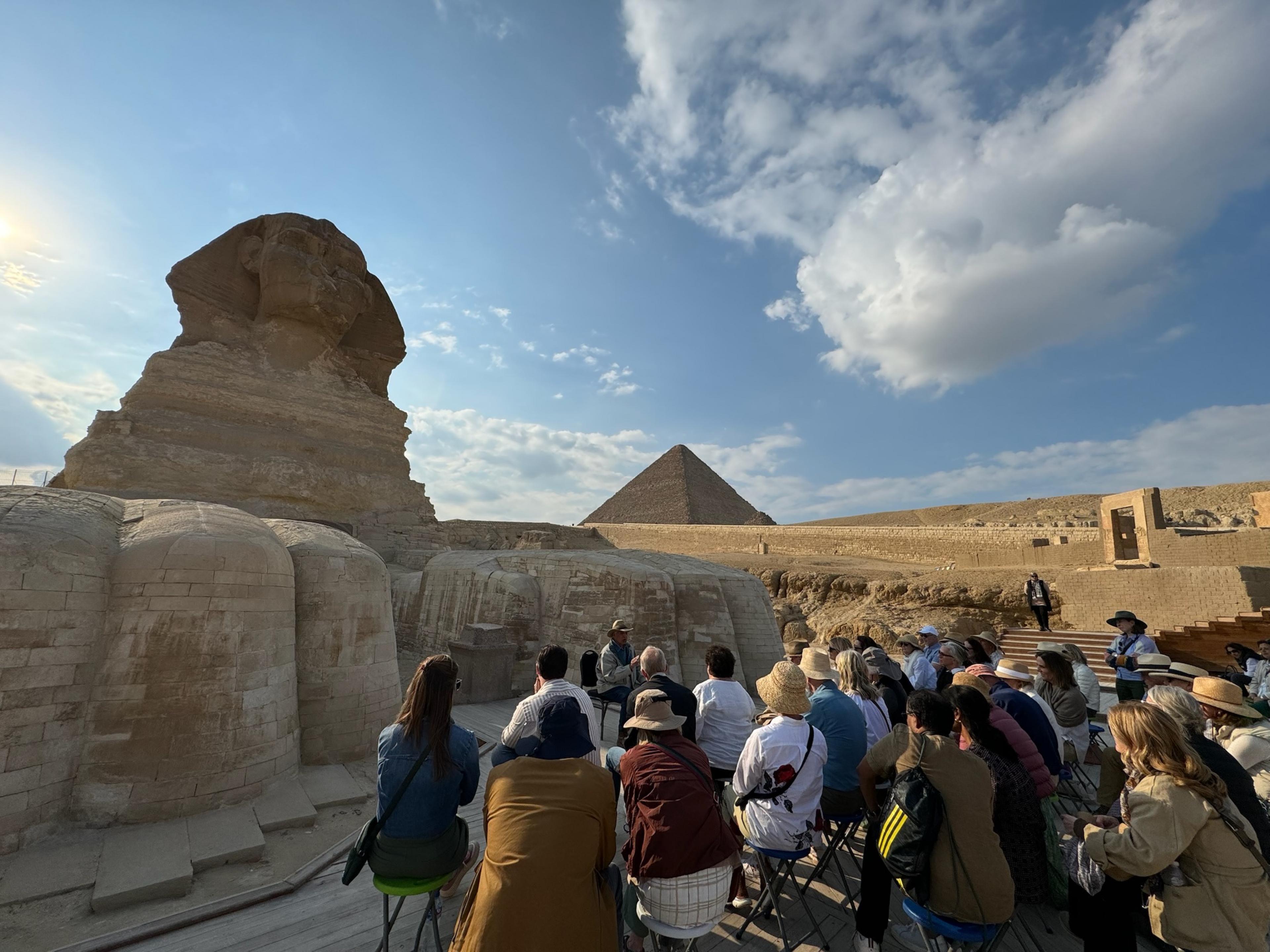 group standing in front of the sphinx