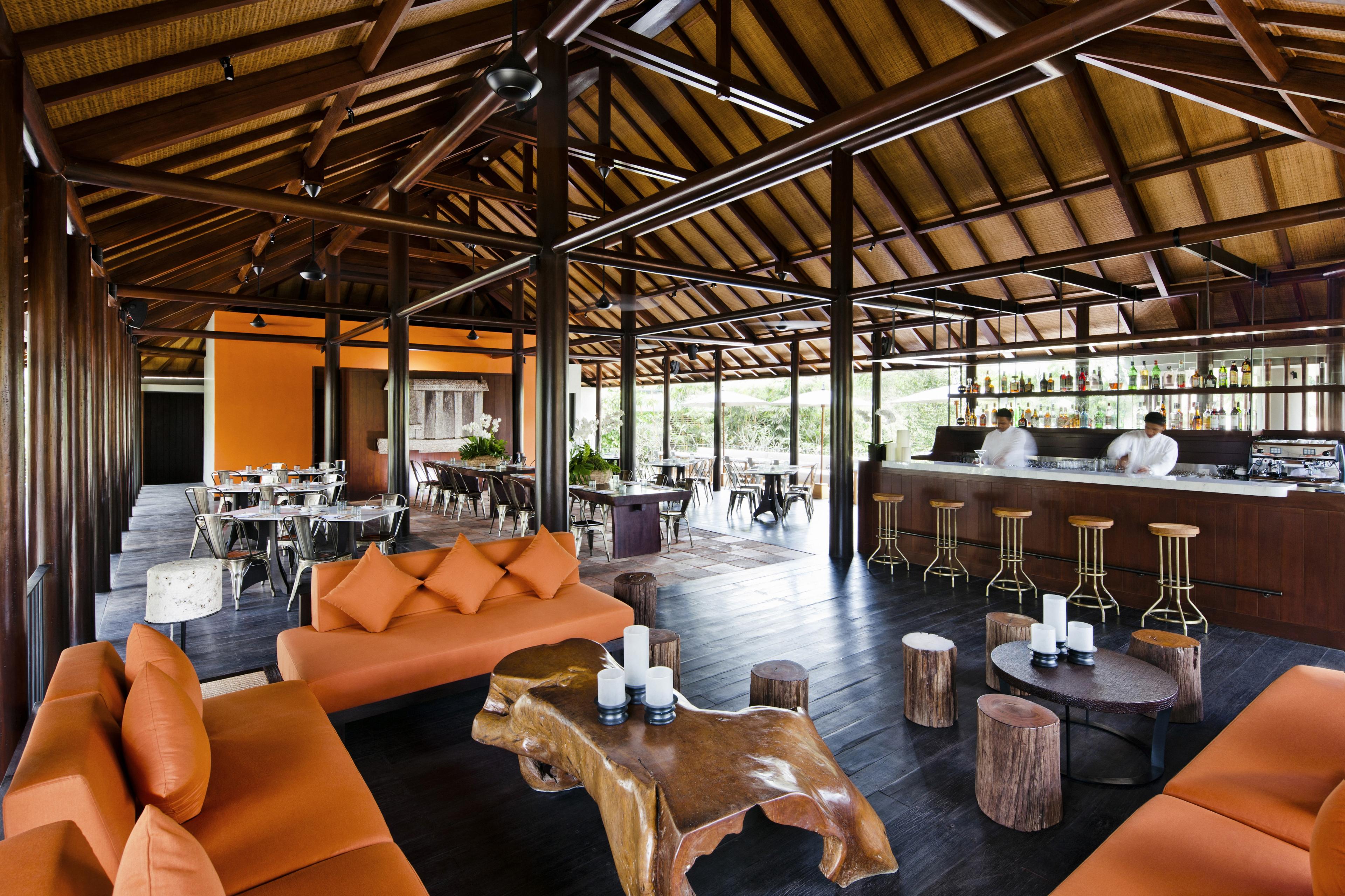 interior of open air restaurant and orange furniture