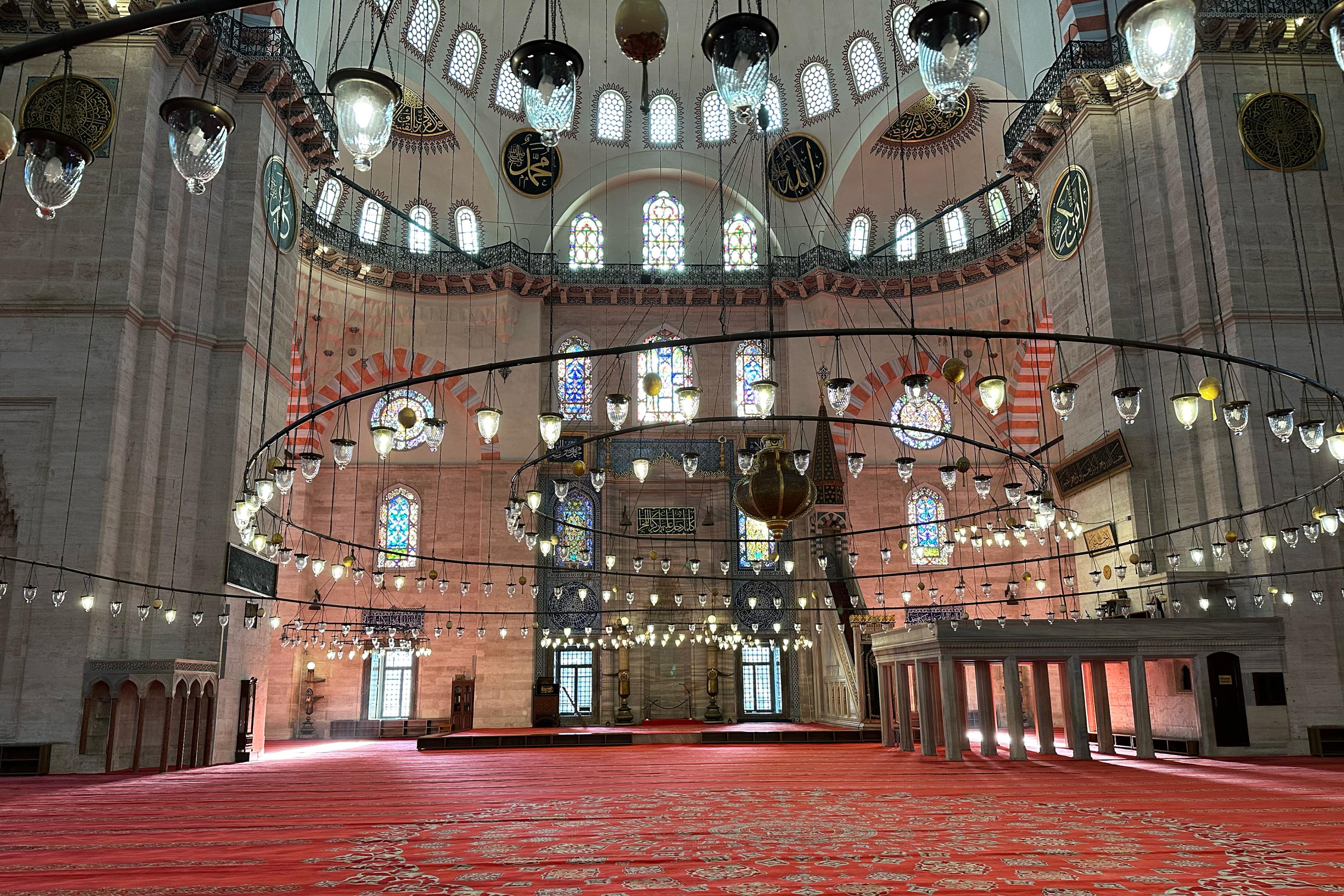 mosque interior with massive round candle holders