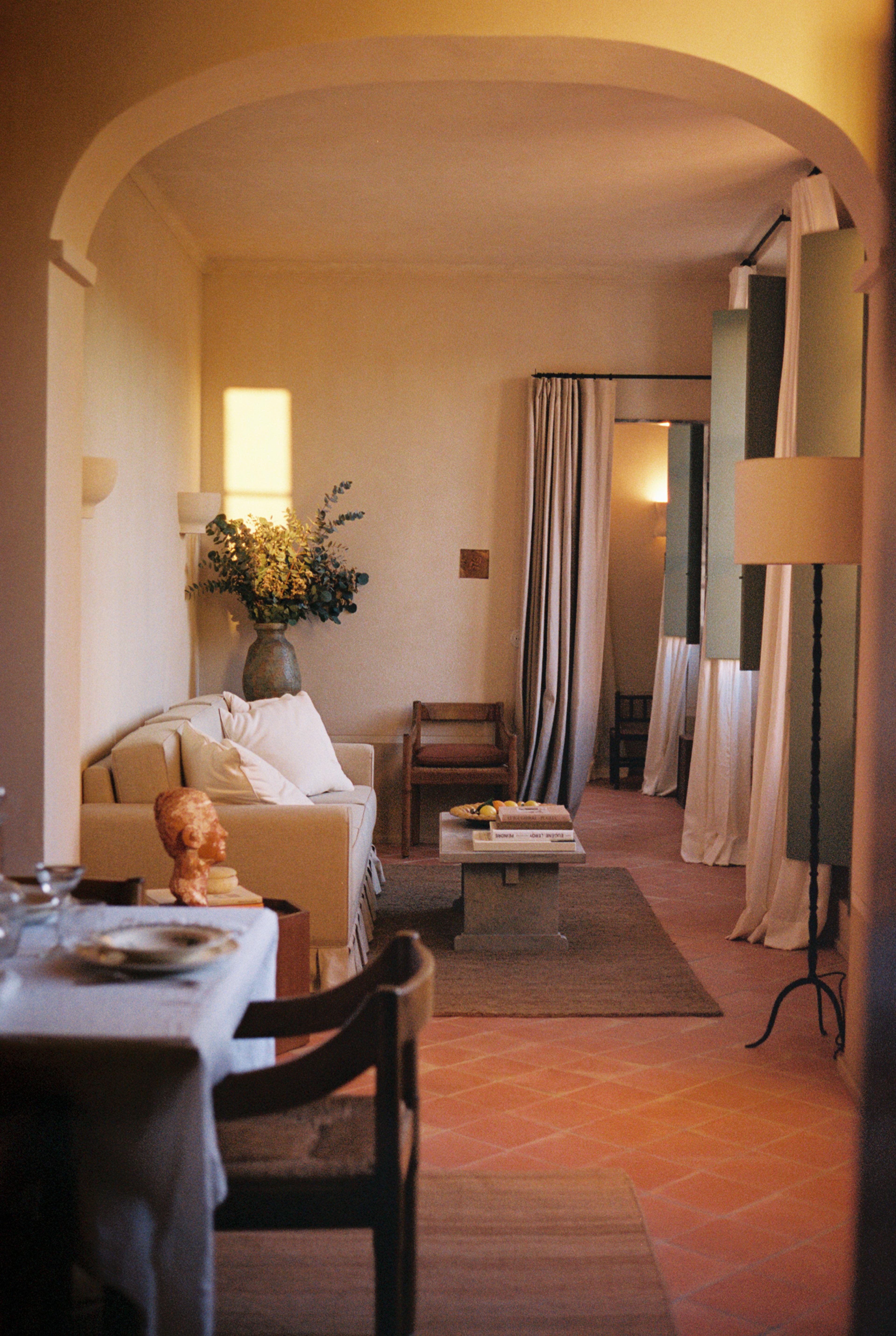 hotel hallway with seating on left