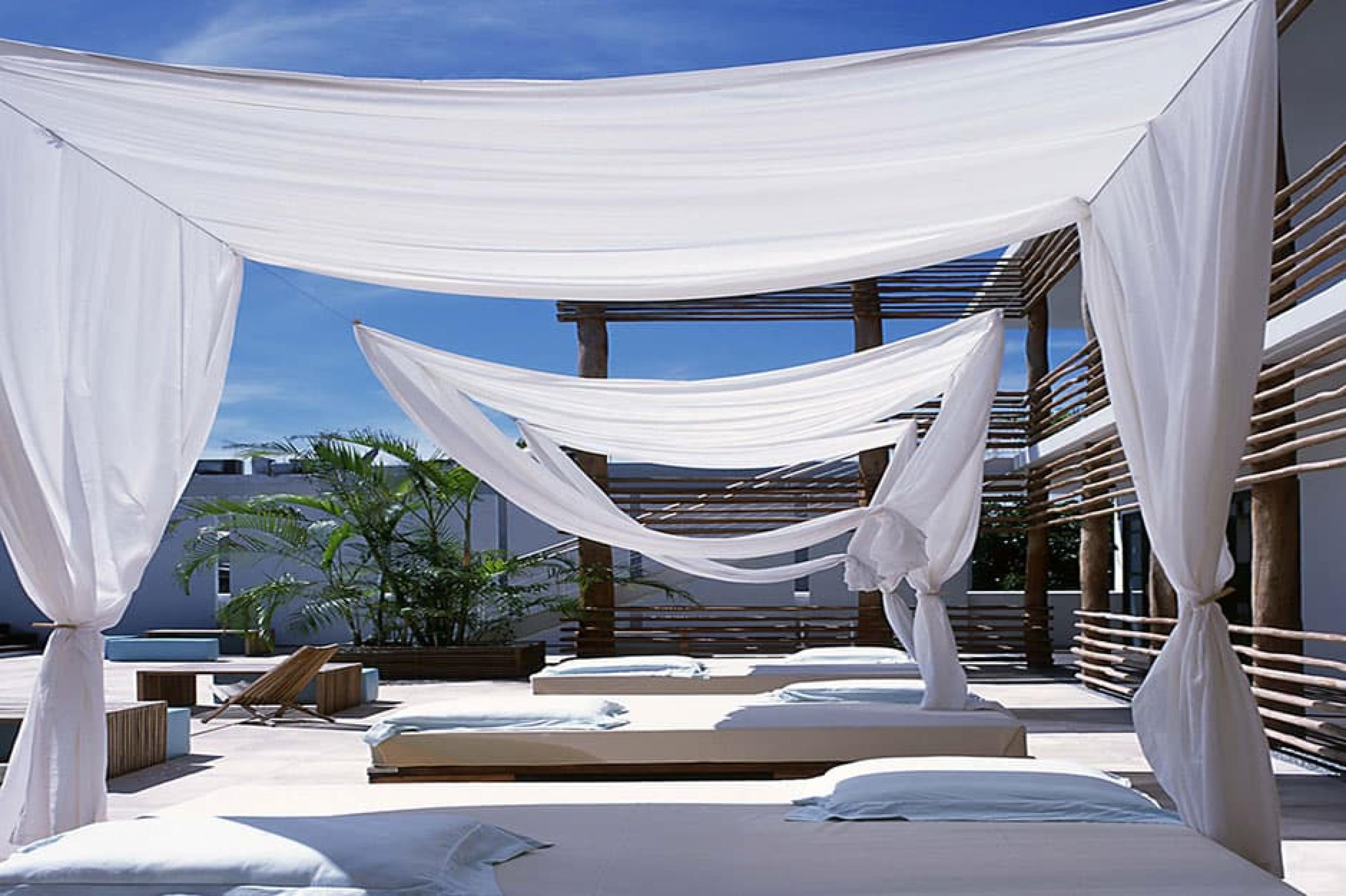 Daybed at Deseo, Riviera Maya, Mexico - Photo by Jan Luc Lalou