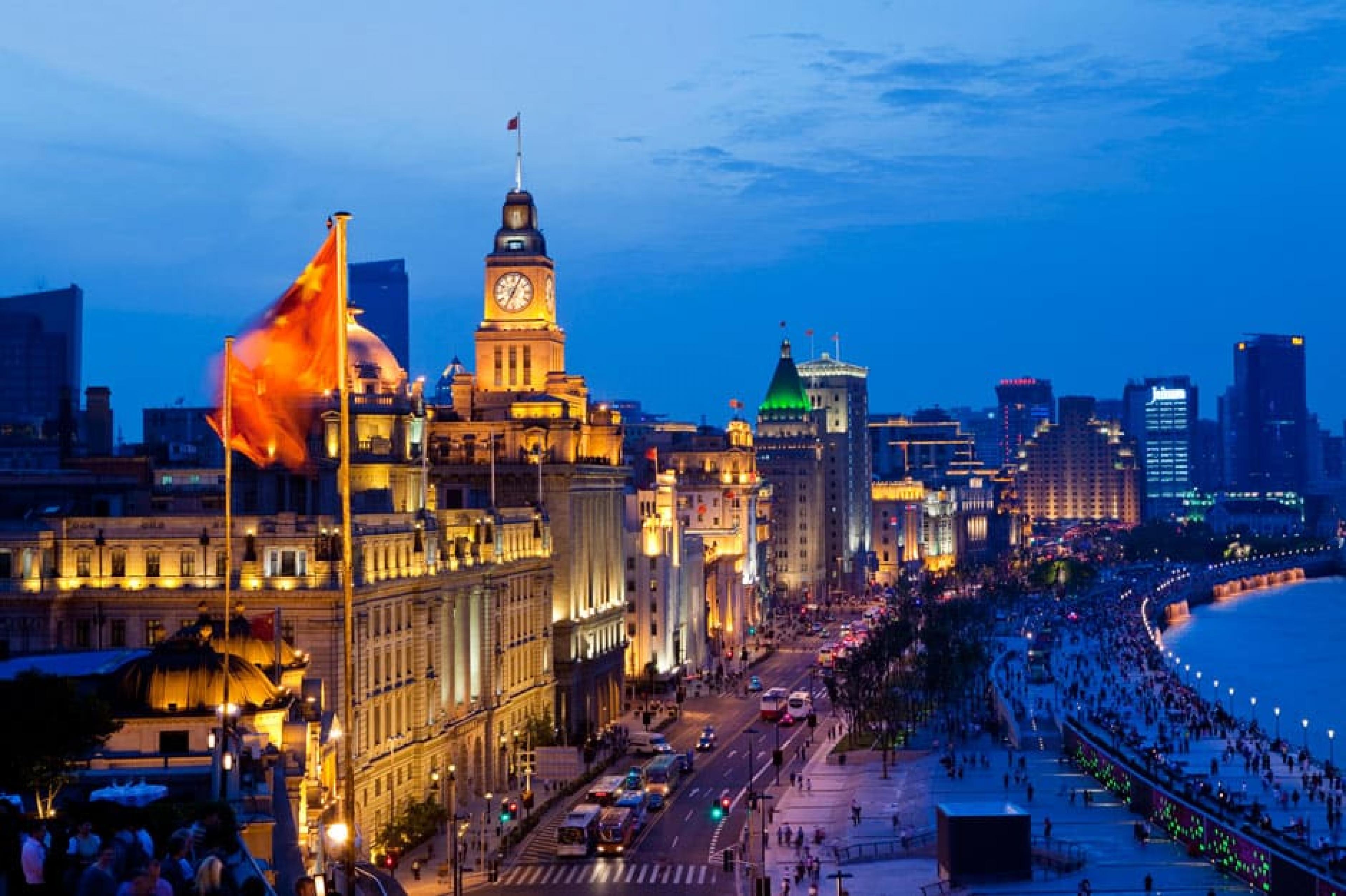 City landscape in evening - Shanghai, China - Courtesy of the Fairmont Peace Hotel