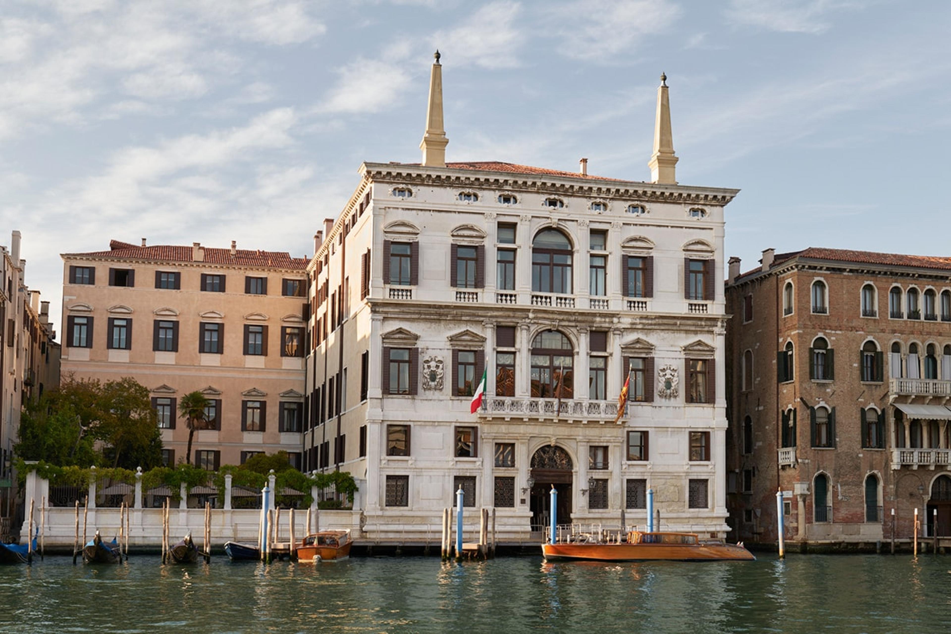 a grand Venetian palace along a canal 